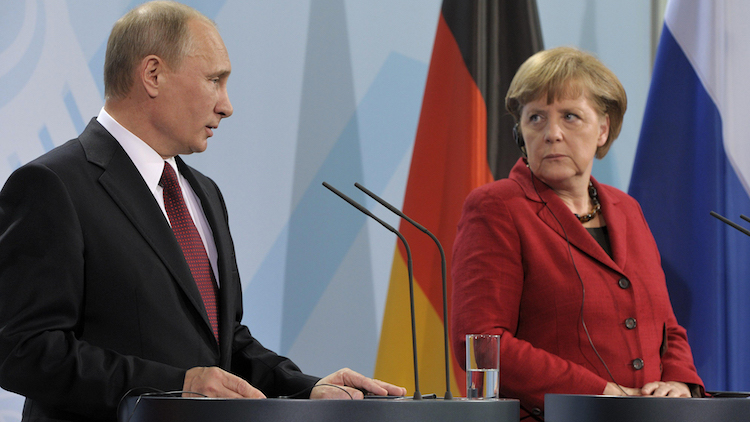 Angela Merkel glares at Vladimir Putin.