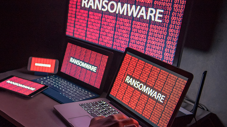 red computer screen with word Ransomware on it
