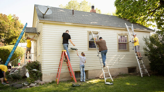 People painting house